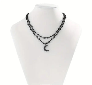 Midnight Moon- Stainless steel w/Black Half Moon Pendant